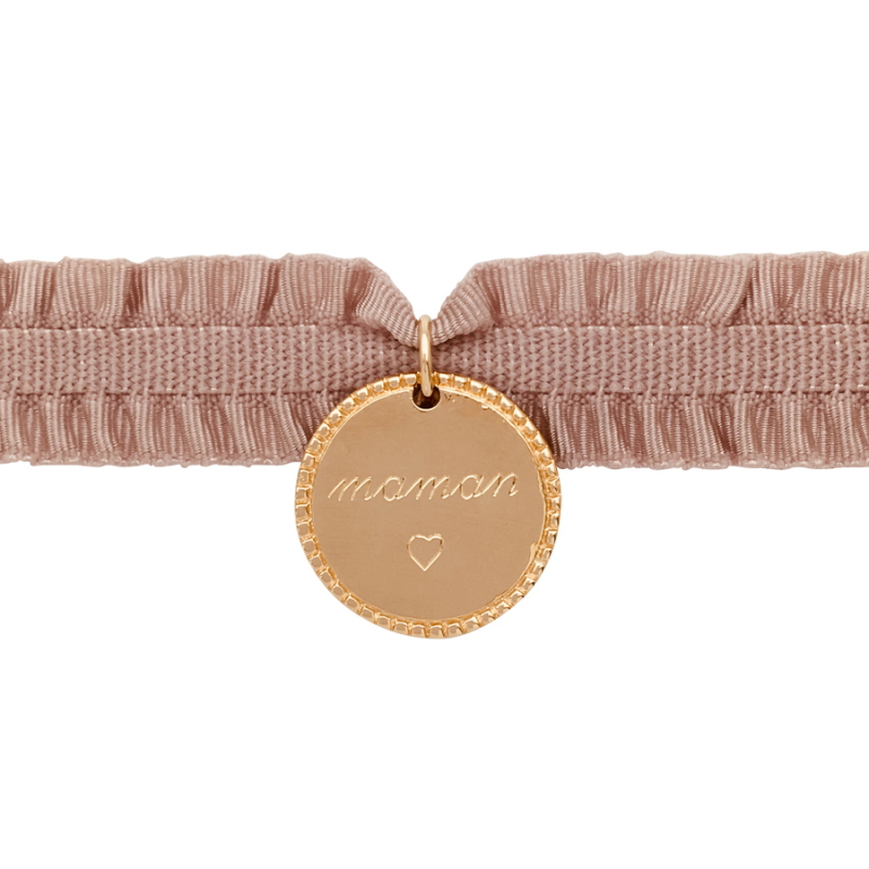 Bracelet médaille sur ruban élastique