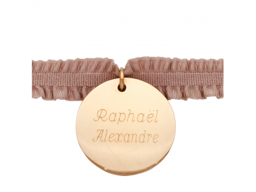 Bracelet médaille sur ruban élastique